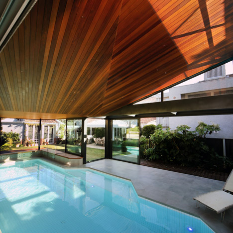 Origami Pool House by Made Group features a faceted timber ceiling