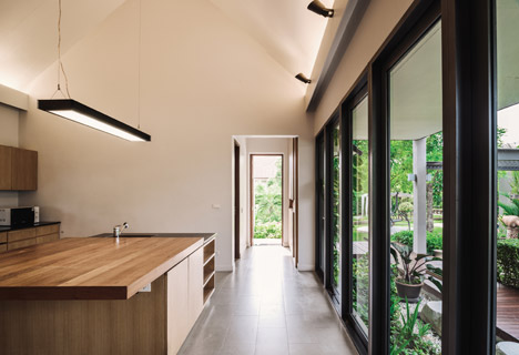The Triangle House by Phongphat Ueasangkhomset