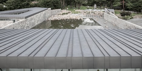 Craggy concrete walls surround South Korean sculpture park by Archium