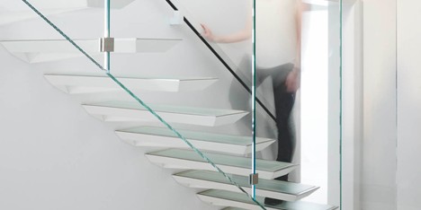 Incorporated adds cantilevered steel and glass staircase to a New York apartment