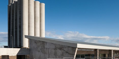 Folded concrete canopy shelters Spanish bus station by Ismo Arquitectura