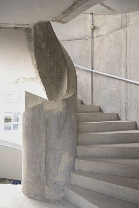 Concrete apartment building in Zellweger Park by Herzog and de Meuron