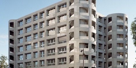Staircase towers form corners of Uster apartment building by Herzog & de Meuron