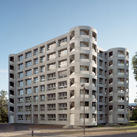Staircase towers form corners of Uster apartment building by Herzog & de Meuron