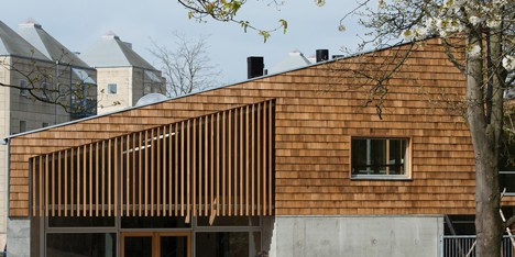 Shingled community centres by Sophus Søbye Arkitekter face into Copenhagen parkland