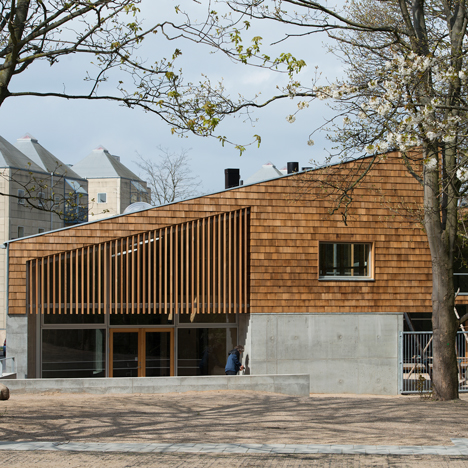 Shingled community centres by Sophus Søbye Arkitekter face into Copenhagen parkland