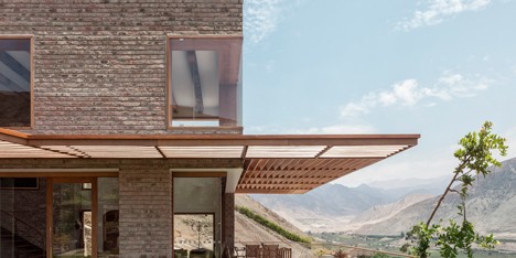 Rafael Freyre uses natural and local materials to connect House in Azpitia with its setting