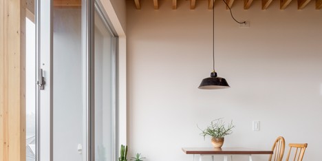 Snark and Ouvi’s house for an illustrator features exposed wooden beams