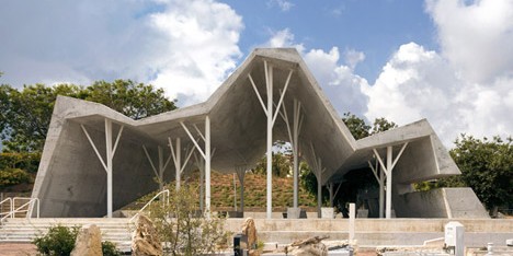 Jagged concrete canopy by Ron Shenkin shelters mourners at a cemetery in Israel