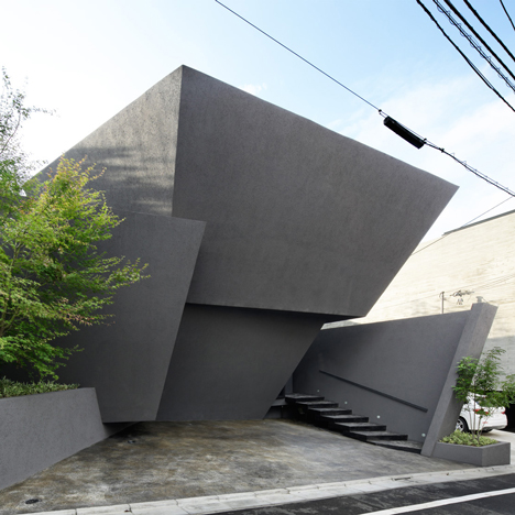 Angular black walls fold around SRK home in Tokyo by ARTechnic Architects