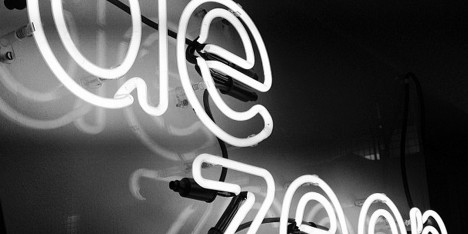 Dezeen neon logo