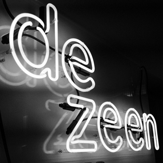 Dezeen neon logo