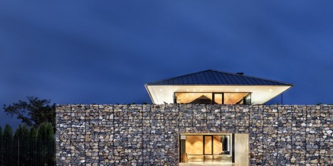 Observation House by I/O Architects features gabion walls and a grassy viewing deck