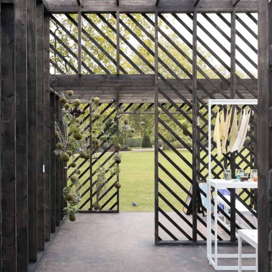 Claridge Architects designs blackened timber pavilion for Plants Out Of Place exhibition