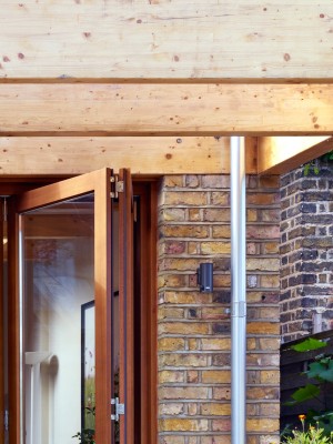 Timber exoskeleton house by Tate Harmer