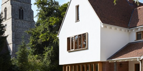West Stow Lodge by Project Orange features a traditional exterior and a pared-back interior