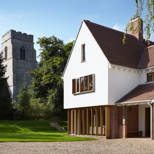 West Stow Lodge by Project Orange features a traditional exterior and a pared-back interior