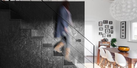 Inês Brandão installs black box of rooms inside converted barn home