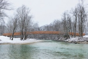 Wooden footbridge by DANS architects