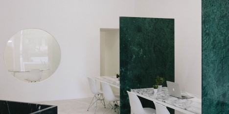 Fala Atelier adds green, grey and black marble inside Porto estate agents