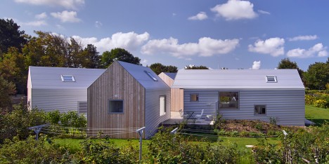 Five buildings surround a courtyard to form Danish summer house by Jarmund/Vigsnæs