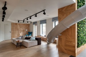 Apartment with a slide by KI Design Studio