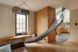 Apartment with a slide by KI Design Studio