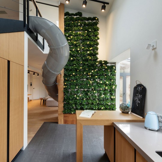 Apartment with a slide by KI Design Studio