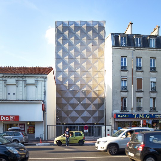 Parisian dance school by Lankry Architectes features faceted metal walls