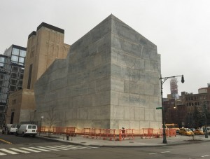 Photograph showing concrete volume on street corner