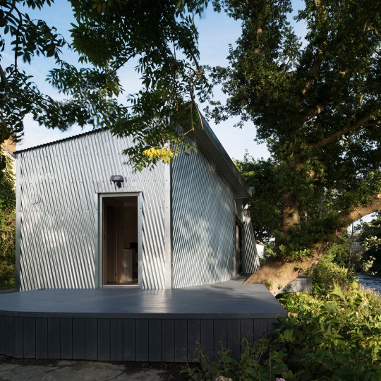 The Rivershed office built on a riverbank in Wales by Freshwest