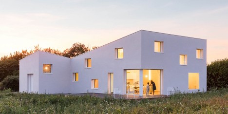 Square windows puncture Alireza Razavi’s monolithic House for a Photographer in Brittany