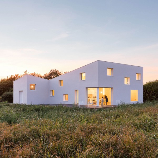 Square windows puncture Alireza Razavi’s monolithic House for a Photographer in Brittany