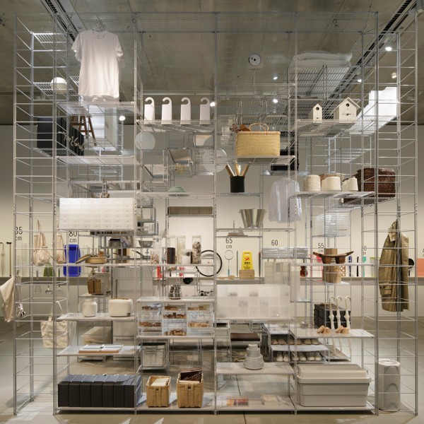 Muji shelving units combine to create a living space in Fumihiko Sano’s installation