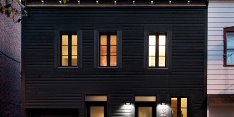 Architecture Open Form creates black facade for historic Montreal home