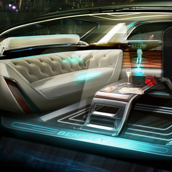 Image showing what Bentley's future autonomous vehicle might look like, featuring large sofas and a holographic butler