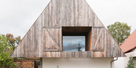 GENS “hides” a contemporary house inside a traditional but top-heavy Alsatian building