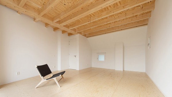 House in a House by Global Architects photographed by Mirko Merchiori