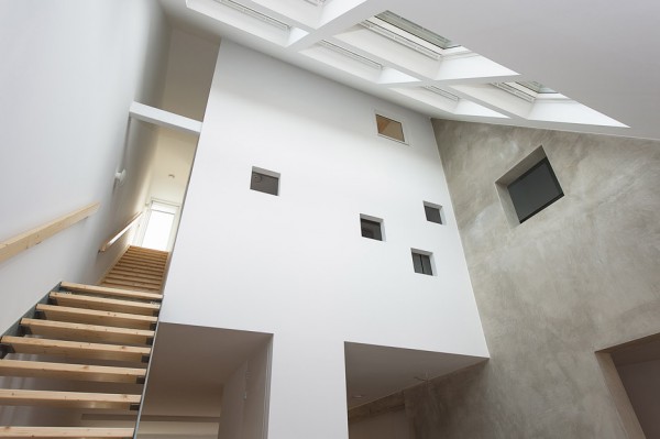House in a House by Global Architects photographed by Mirko Merchiori