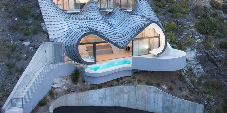 House on the cliff by Gilbartolome Architects in Granada, Spain