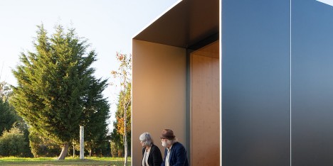 MIMA Light is a small prefabricated house raised up from the landscape on a near-invisible base