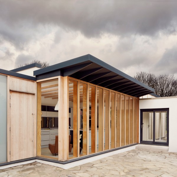 TDO adds boxy plywood-framed extension to old Windsor cottage