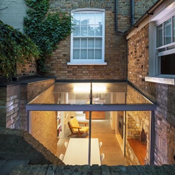 Space Group Architects add sunken glass box extension to heritage-listed London house