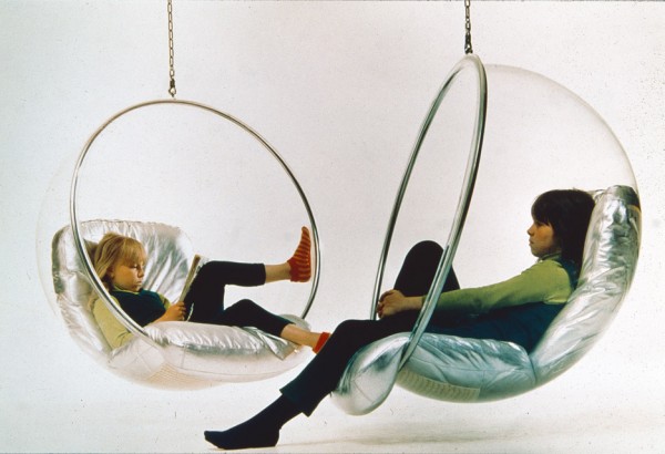 Aarnio's daughters Rea and Marja-Leena in Bubble Chairs, early 1970s