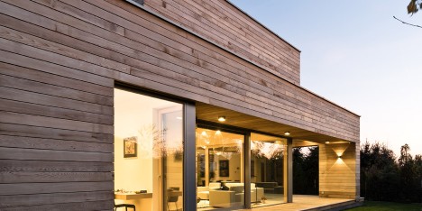 Mariusz Wrzeszcz completes house in Poland with cedar walls inside and out