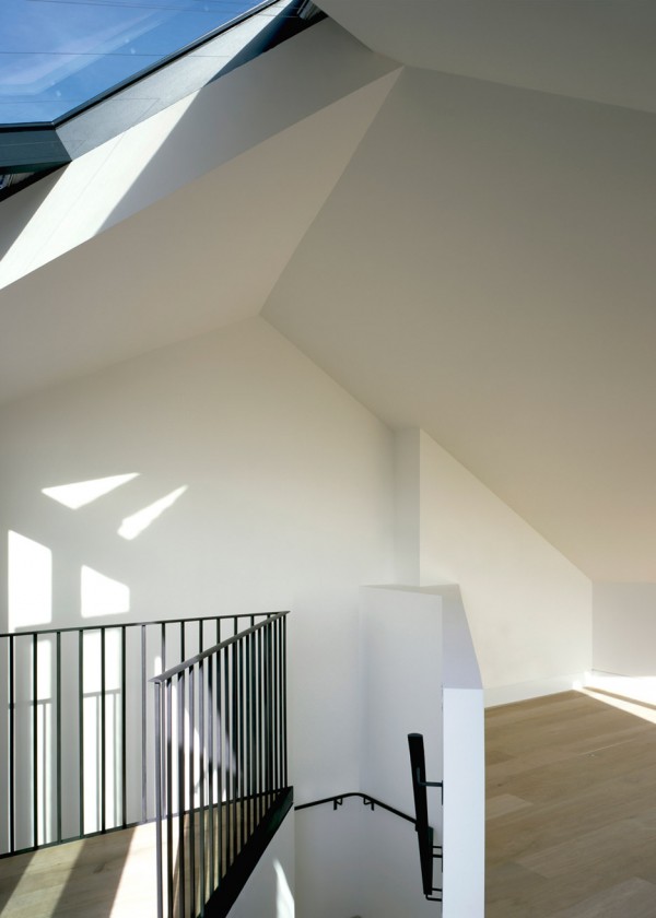 Photograph by Helene Binet Corner House by DSDHA residential mixed-use brick architecture London, UK