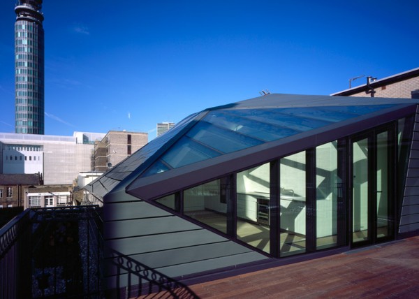 Photograph by Helene Binet Corner House by DSDHA residential mixed-use brick architecture London, UK