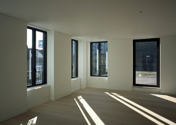 Photograph by Helene Binet Corner House by DSDHA residential mixed-use brick architecture London, UK