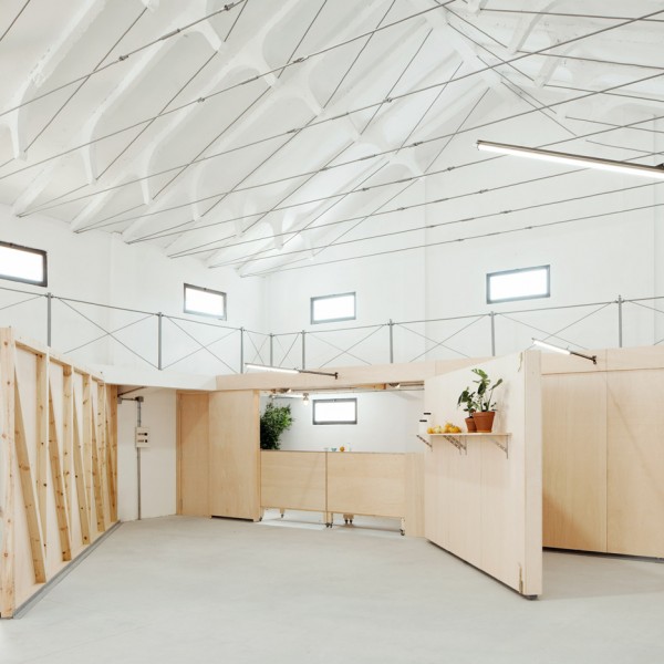 Valentín Sanz converts former warehouse into community centre with a foldaway kitchen