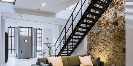 EVA converts former workshop into loft-inspired home for a Dutch couple